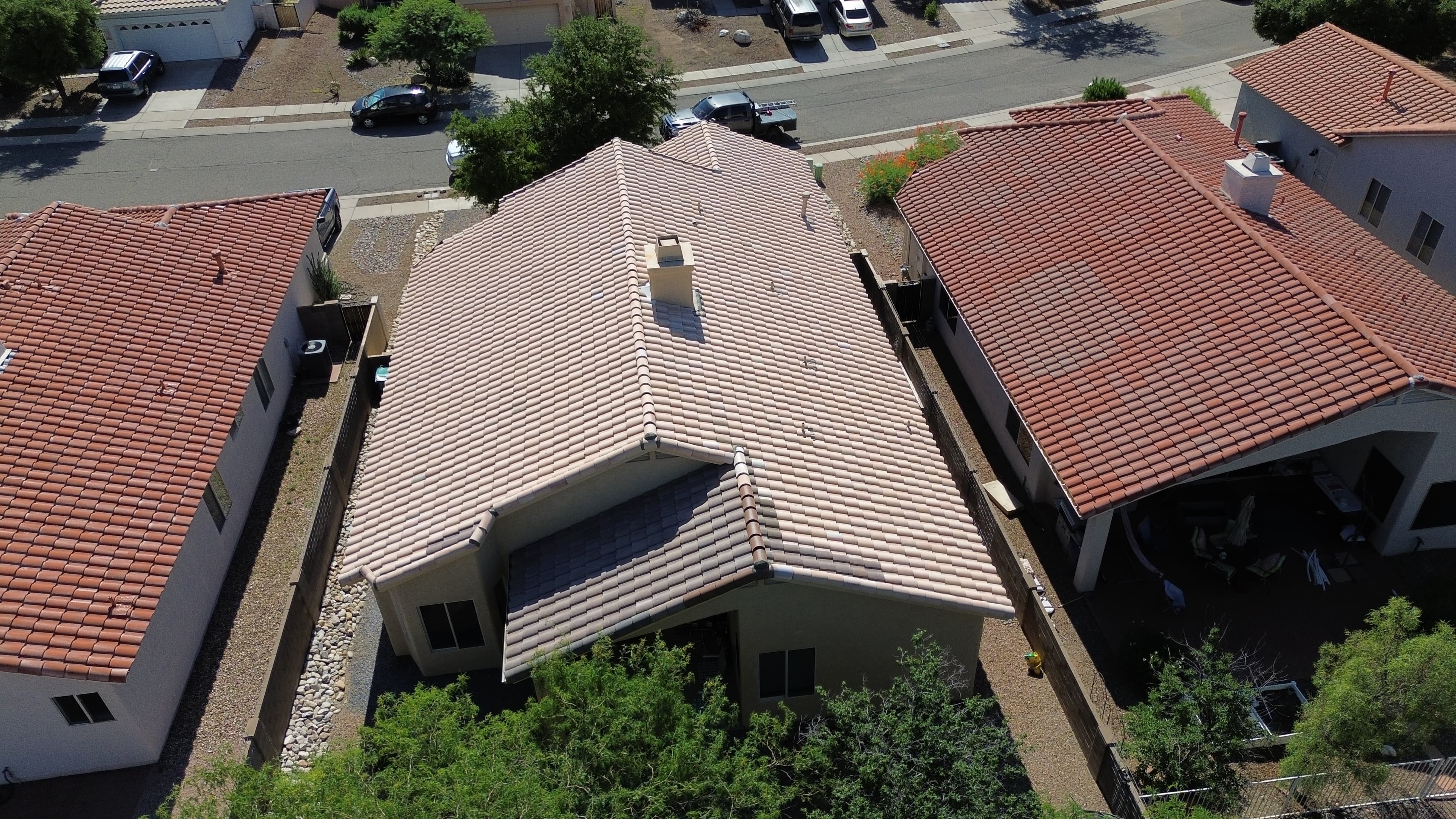 Drone hovering over a Tucson tile roof during inspection
