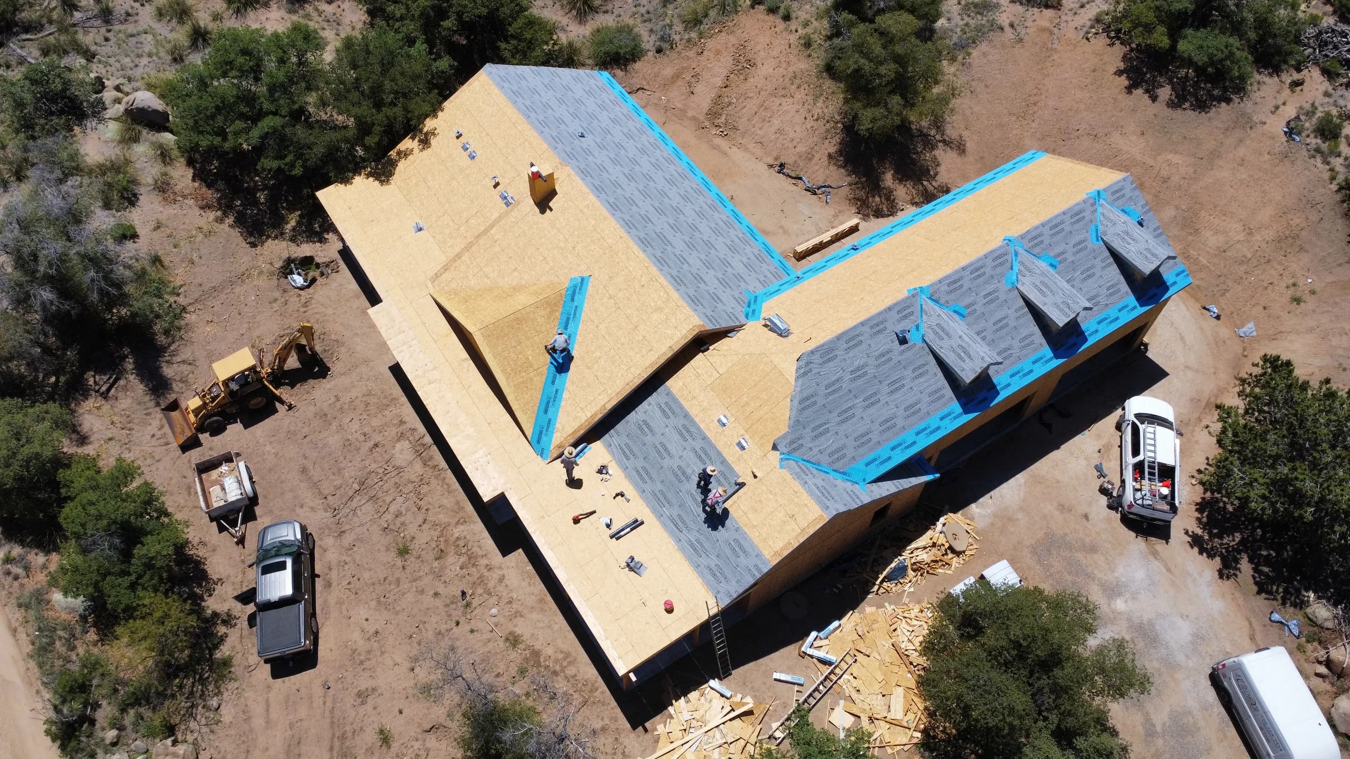 Synthetic underlayment and ice-and-water shield going down on bare OSB decking